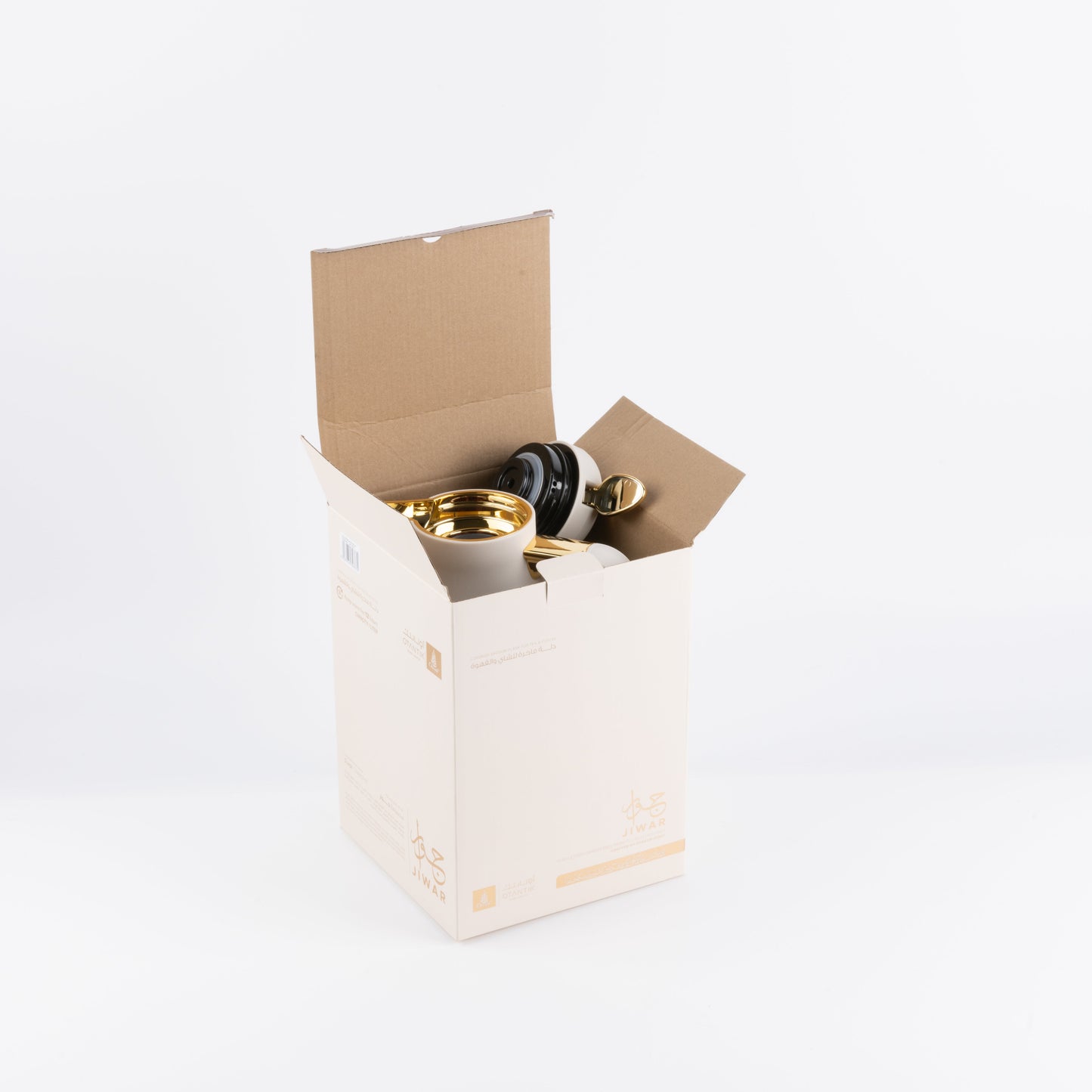 Otantik Home beige gold vacuum flask partially visible inside an open beige cardboard box