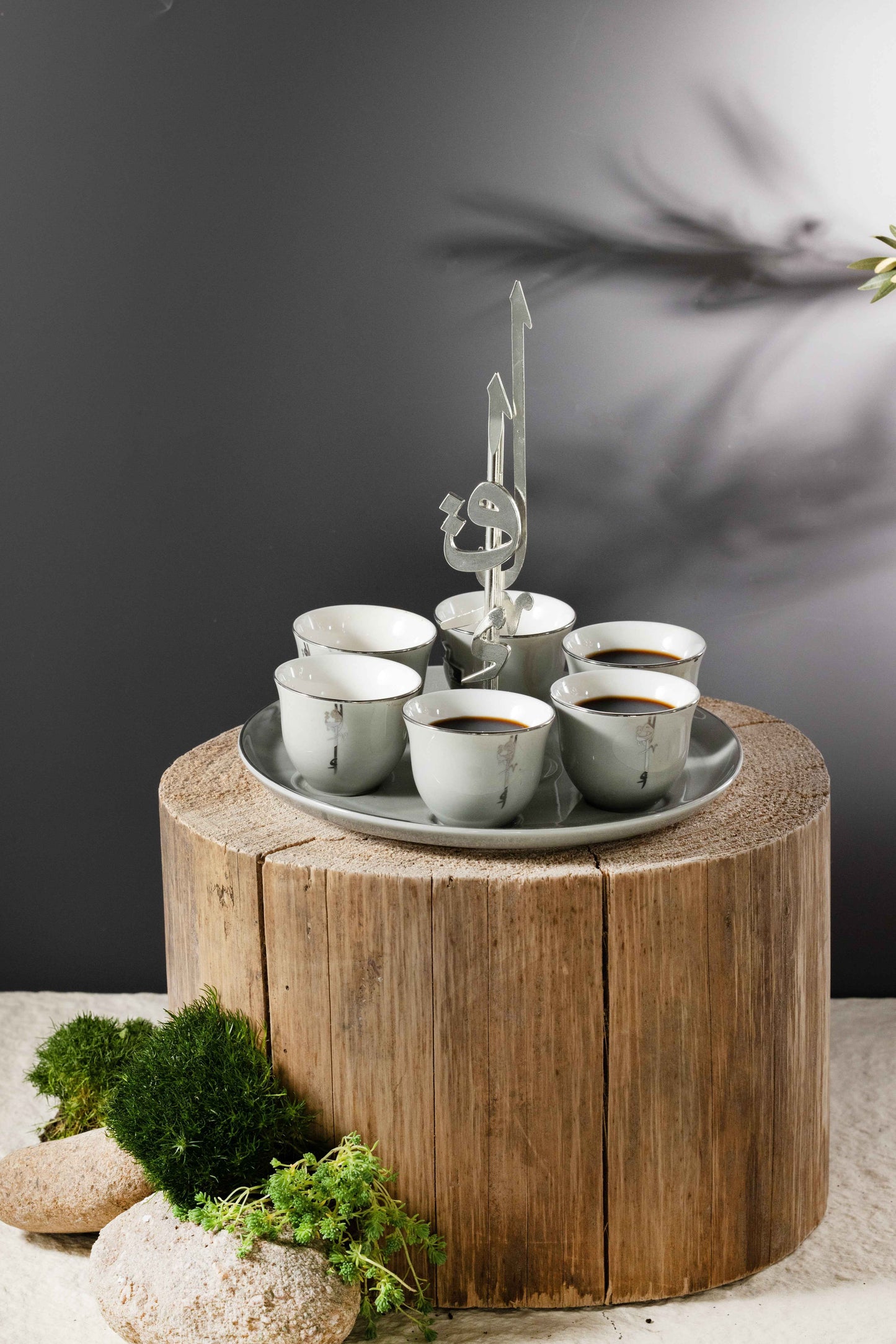 Arabic coffee cups set with holder in white marble design on wooden stump display