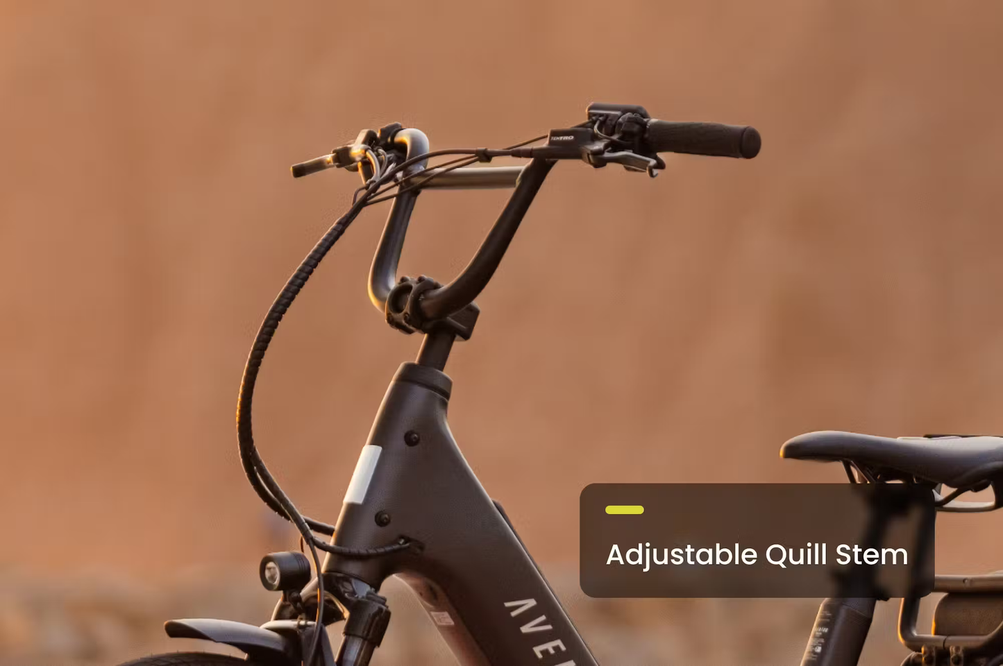 Close-up of Aventon Abound LR cargo e-bike handlebars with adjustable quill stem by Rex E-Bikes