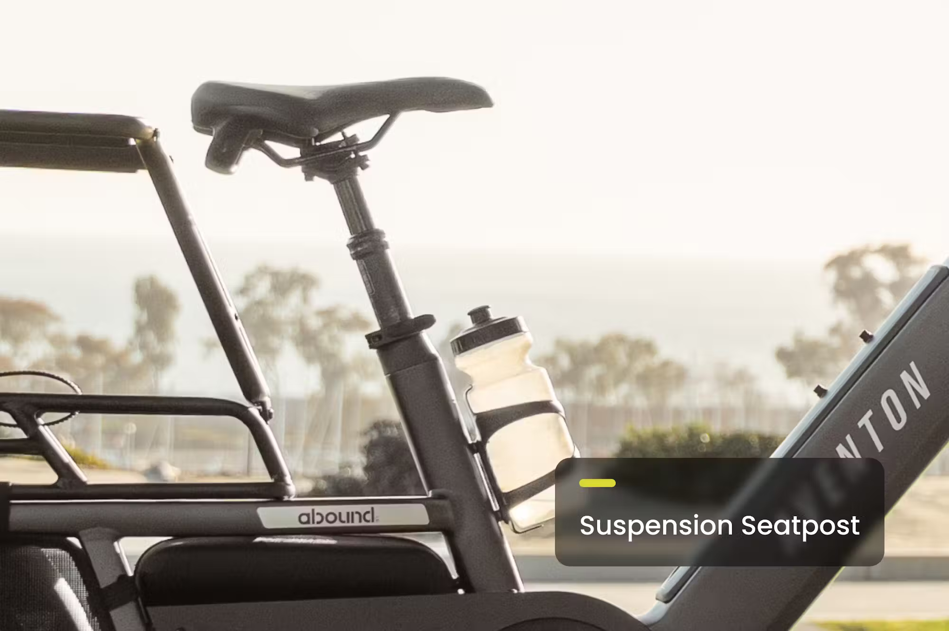 Rex E-Bikes Aventon Abound LR cargo e-bike suspension seatpost with water bottle holder