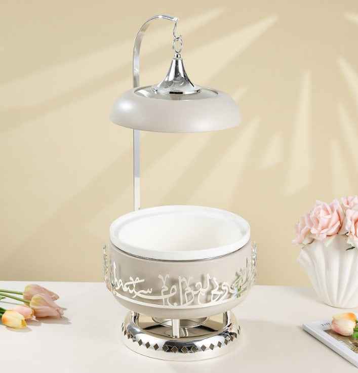 Elegant beige and silver chafer for buffet with decorative details and warming lamp by Otantik Home