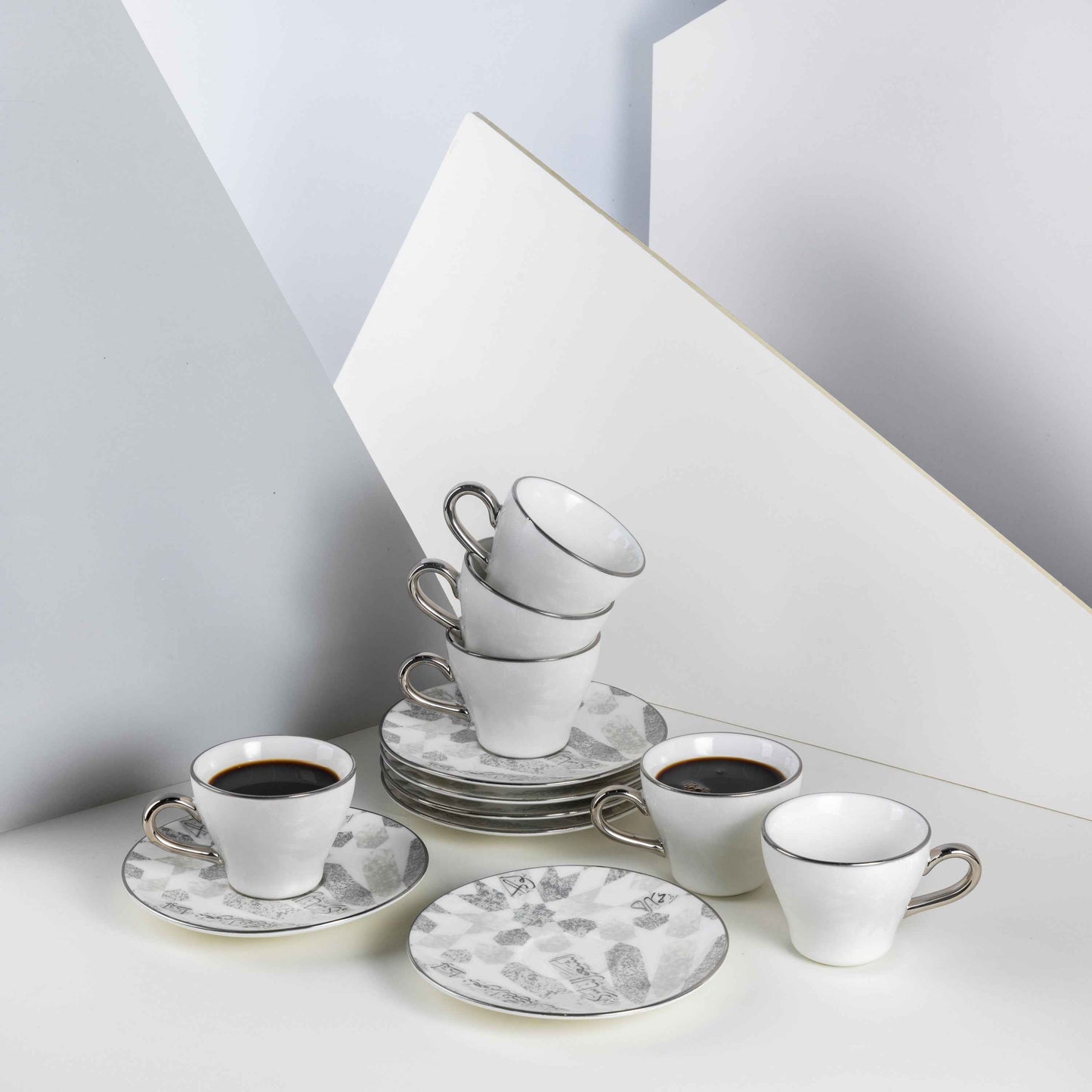 Otantik Home espresso and Turkish coffee cups set with white cups and silver handles on patterned saucers