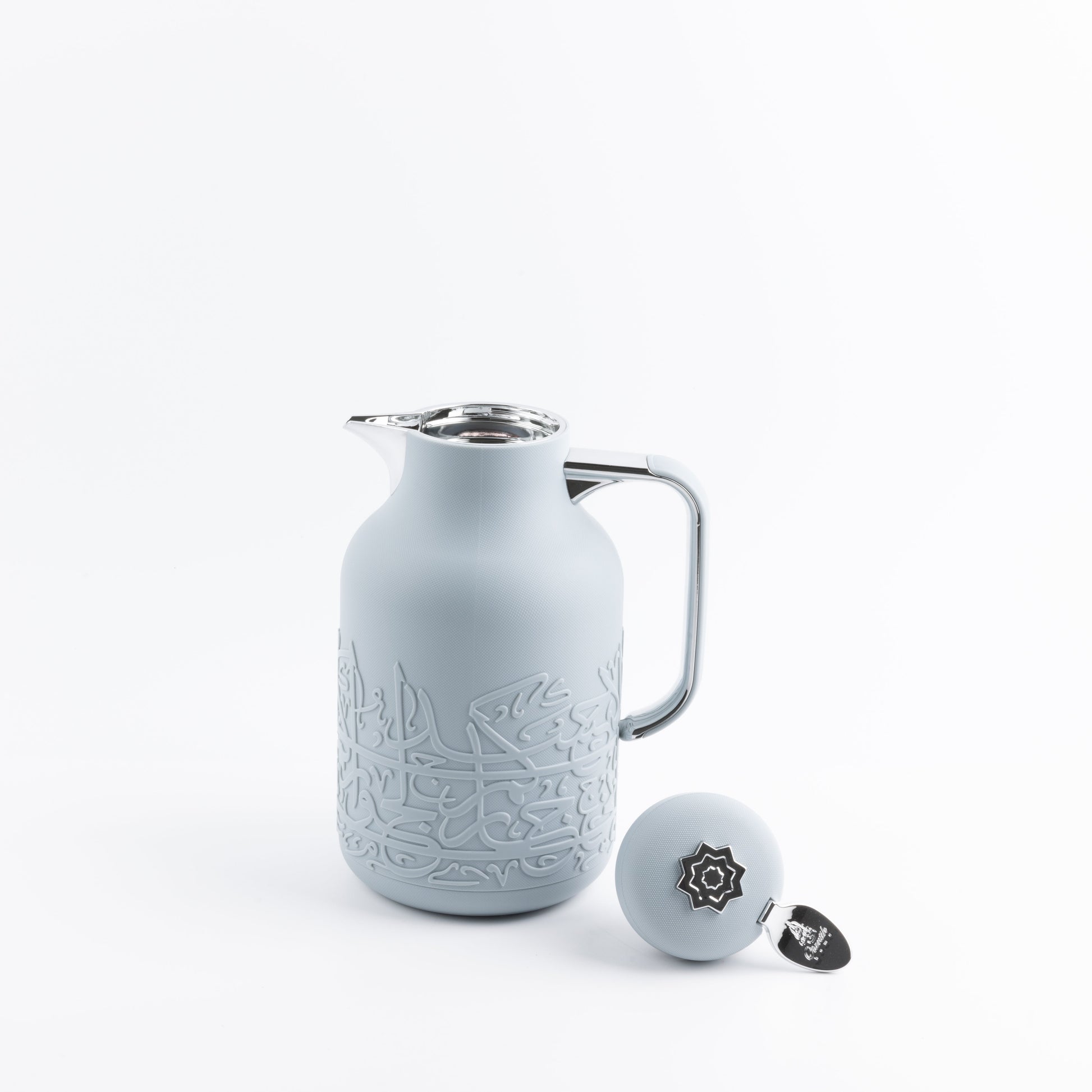 Jiwar vacuum flask haze blue by Otantik Home with intricate embossed design and silver handle