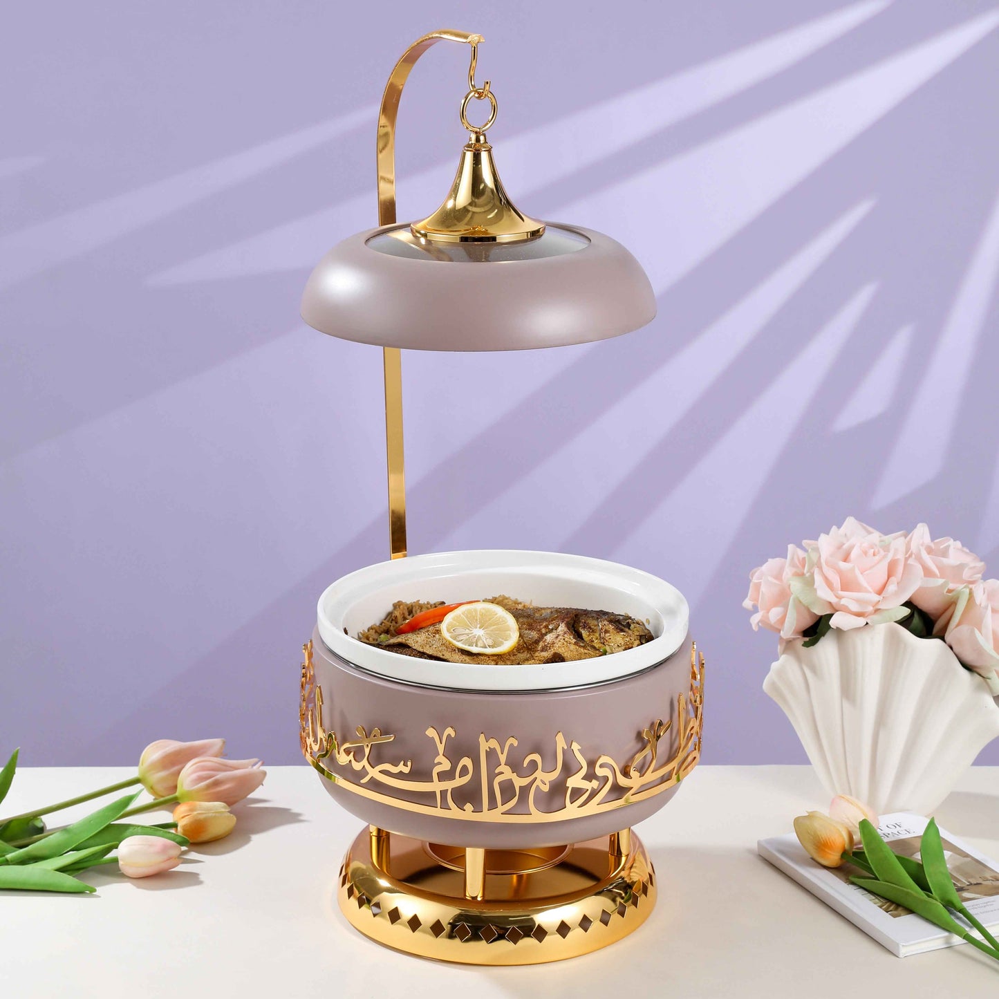 Lavender and gold chafer dish by Otantik Home with decorative Arabic calligraphy and food inside