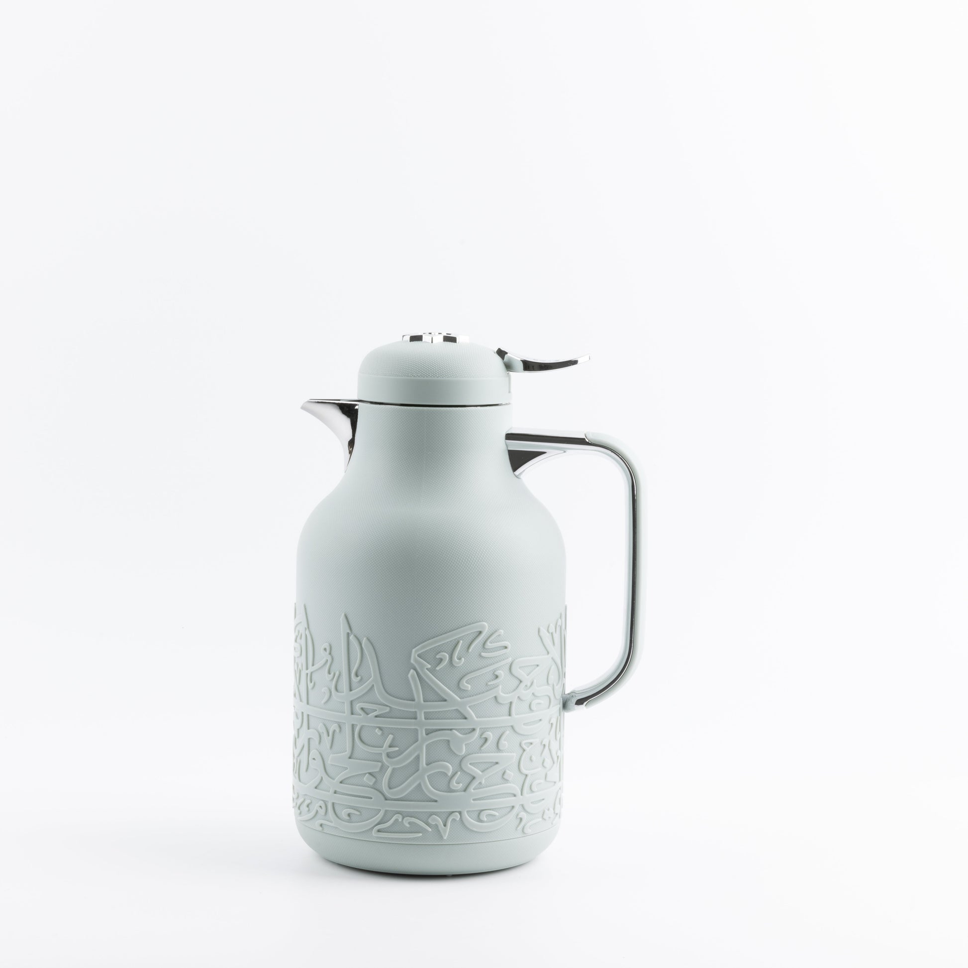 Otantik Home mint green vacuum flask with decorative embossed design and silver handle