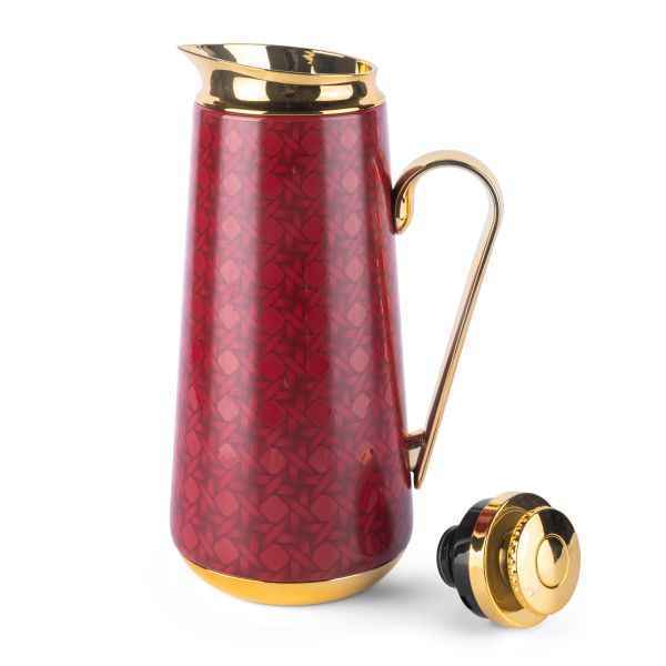 Red and gold rattan vacuum flask with decorative pattern and gold handle by Otantik Home