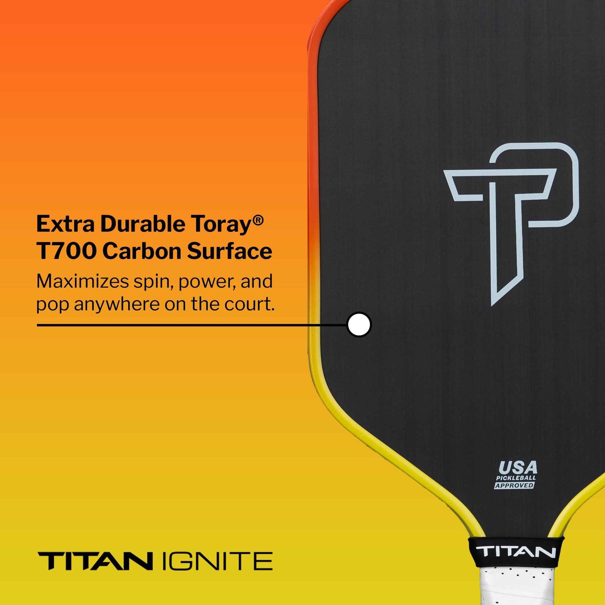 Titan Ignite 16L pickleball paddle close-up showing extra durable Toray T700 carbon surface with black and yellow design