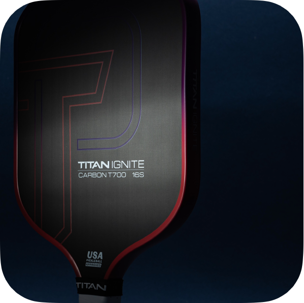 Titan Ignite 16S pickleball paddle with carbon fiber face and sleek black red design