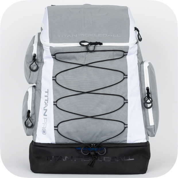 Titan Pickleball Backpack in gray and white with multiple zippered compartments and external bungee cord