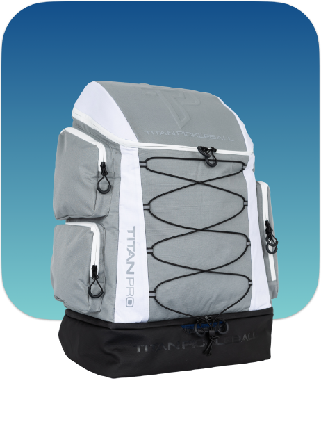 Gray and white Titan Pickleball Backpack with multiple zippered compartments and bungee cord storage