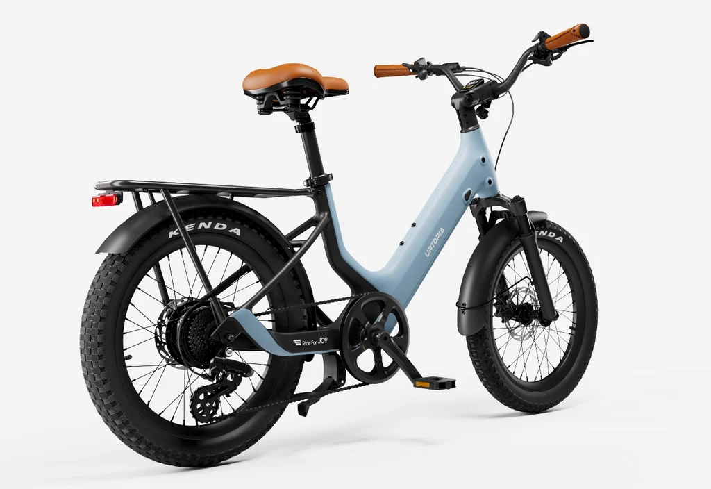 Rex E-Bikes Urtopia Joy Carbon E-Bike in blue with brown seat and grips, fat tires, and rear rack