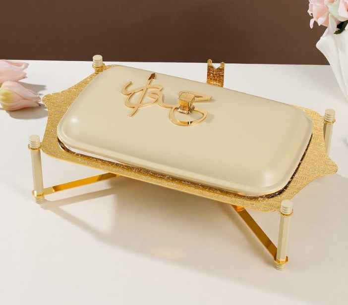 Otantik Home ivory and gold pyrex chafer with decorative gold stand on white surface