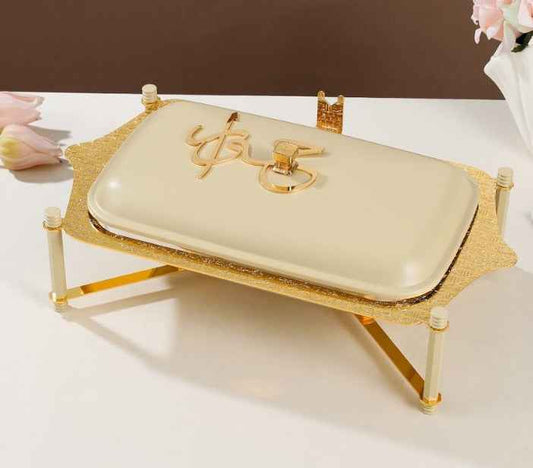 Otantik Home ivory and gold pyrex chafer with decorative gold stand on white surface